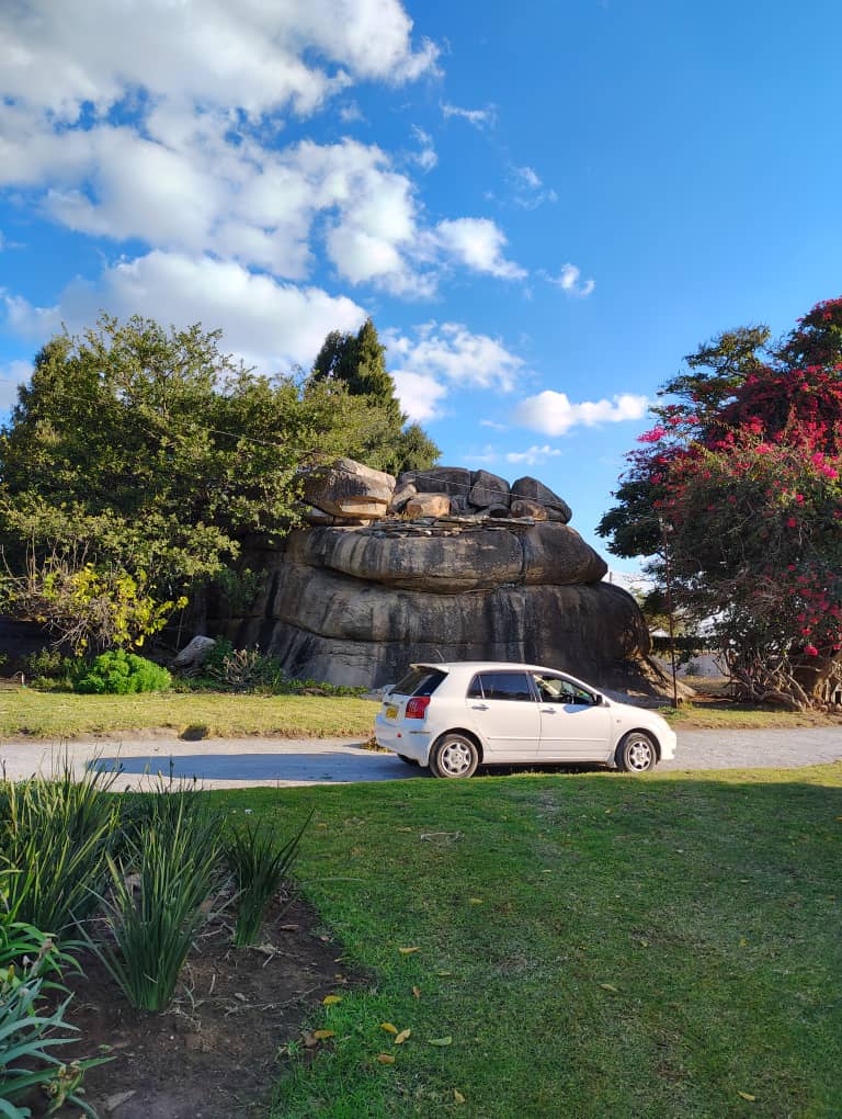 Ancient granite rock formation on the estate